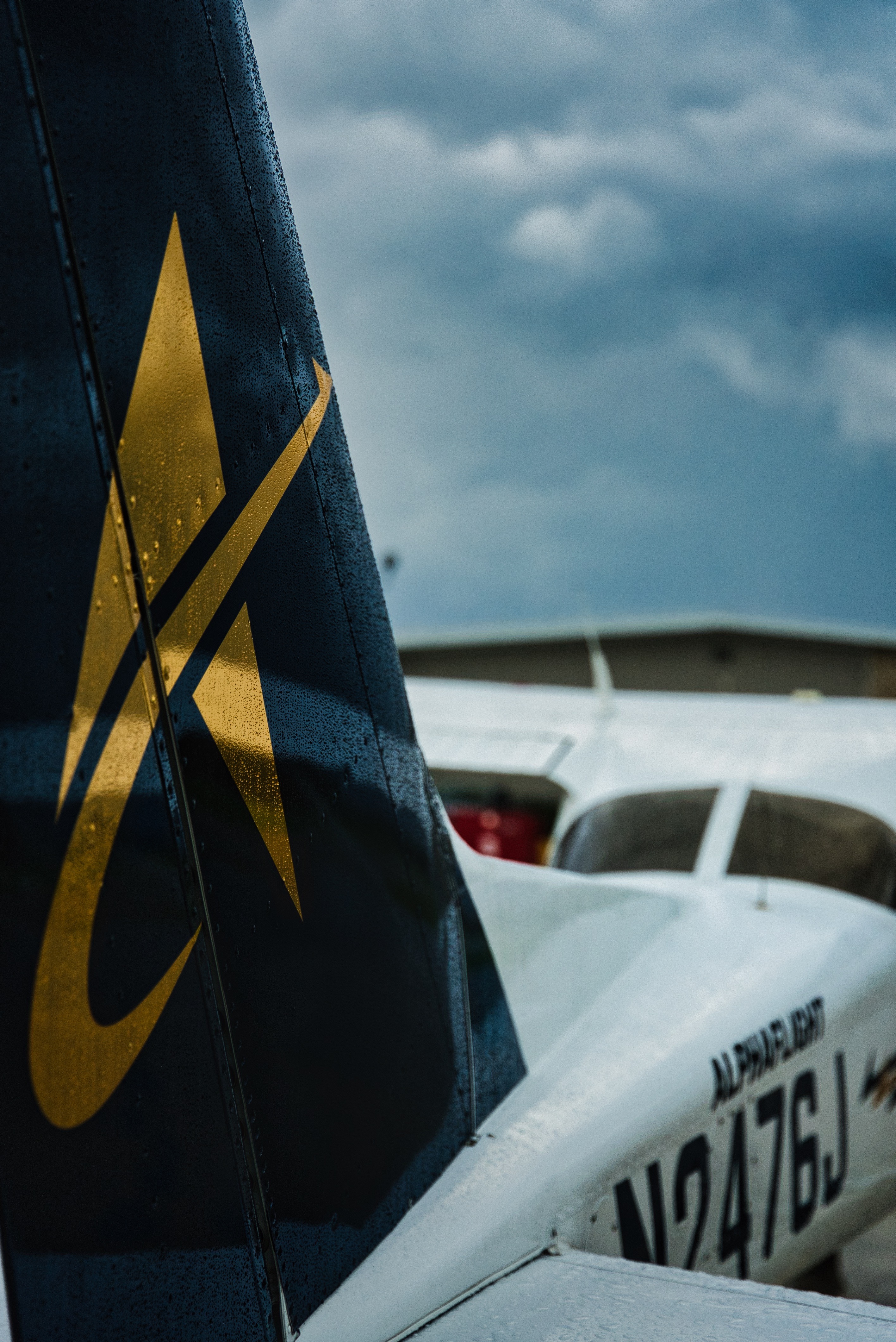 Alpha Flight Academy gold-A tail mark on Cessna 172 N2476J